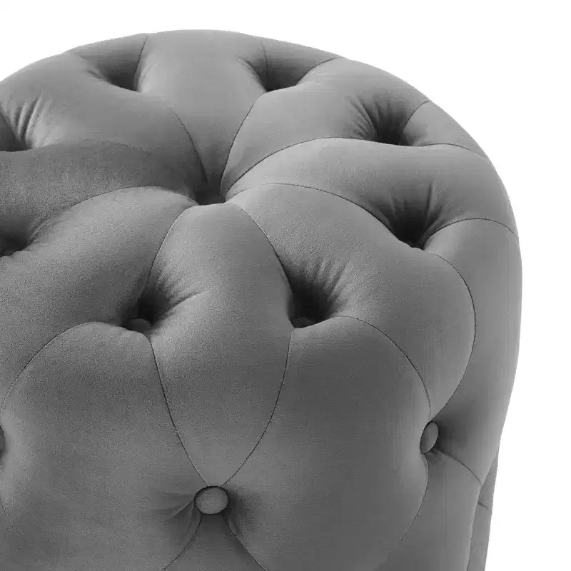 Pouf rond capitonné en velours performance