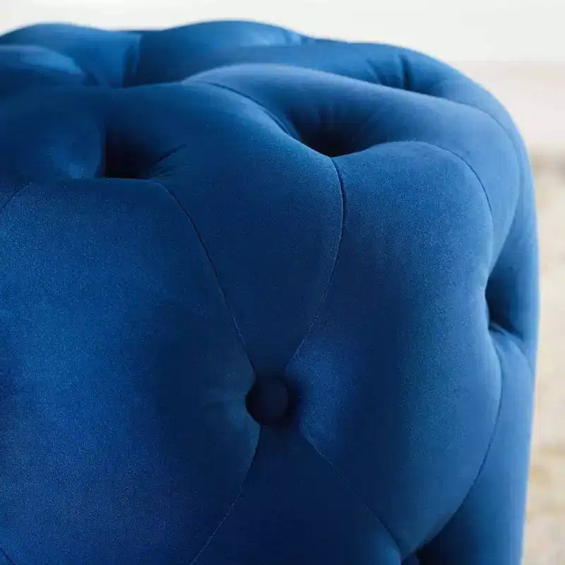 Pouf rond capitonné en velours performance