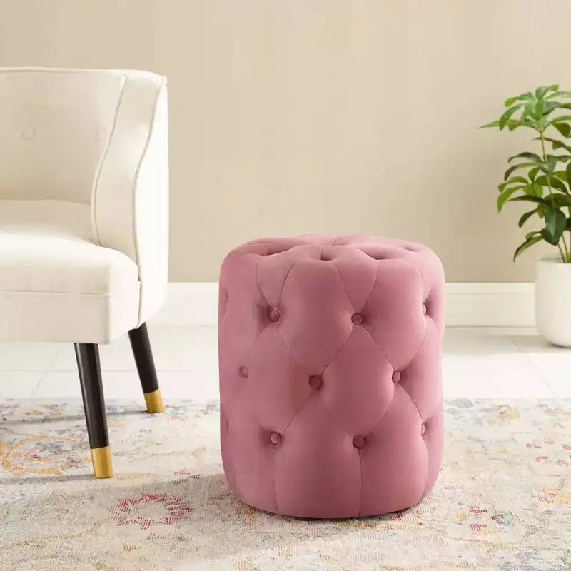 Pouf rond capitonné en velours performance