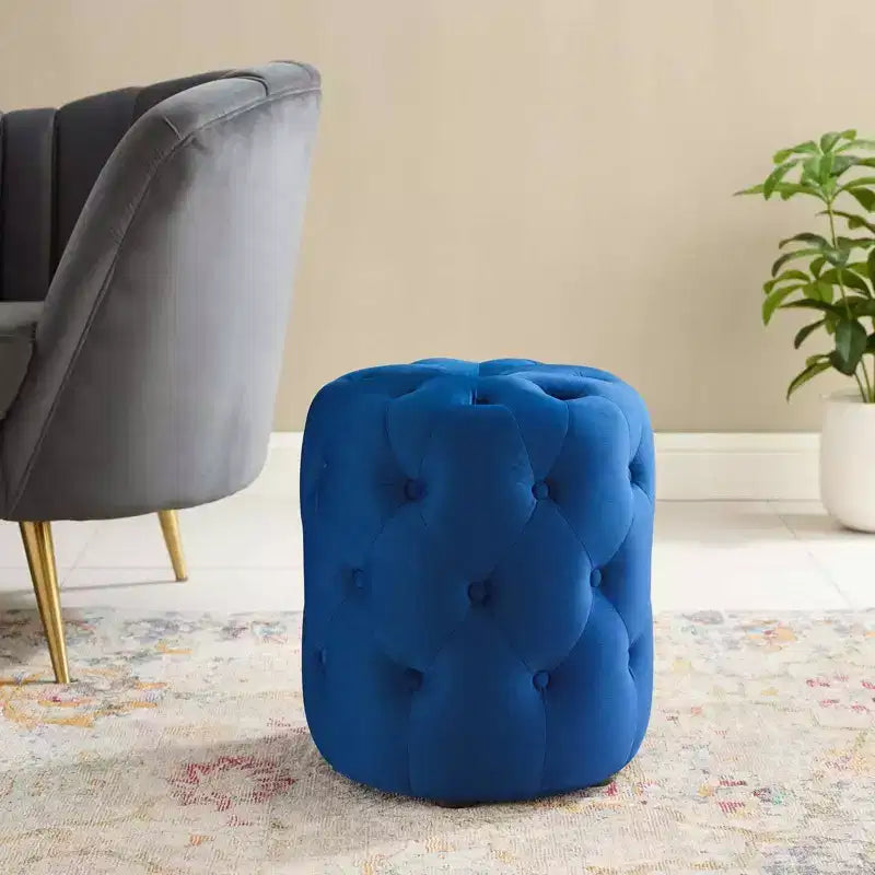 Pouf rond capitonné en velours performance